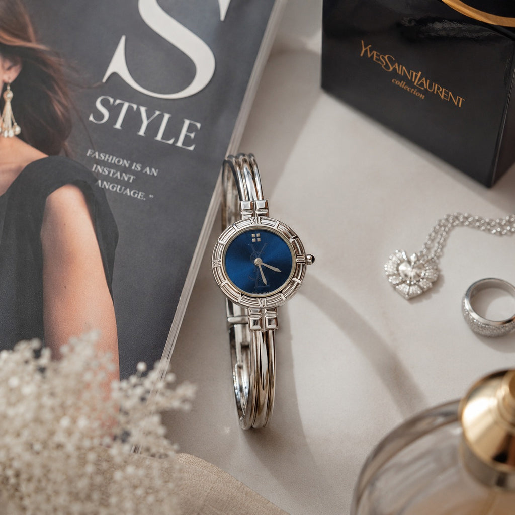 Yves Saint Laurent bangle z niebieską tarczą